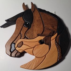 Carved wood horses